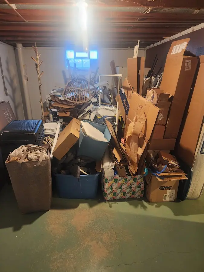 Roll-off dumpster container at job site for 2 Yard Dumpster Rental in India Hook